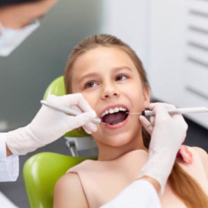 A happy child in the dental chair